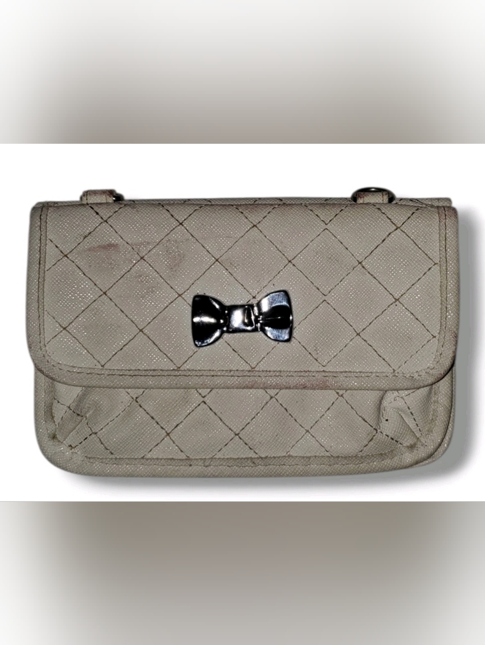 Icing Quilted Cream Clutch with Silver Bow Accent